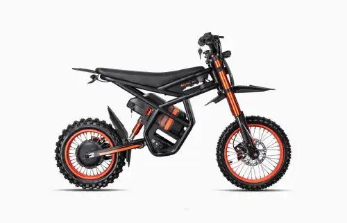 Electric dirt bike with black frame and orange rims, photographed in profile on white background.